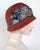 0862MEV Minnie, velour, rust with multi